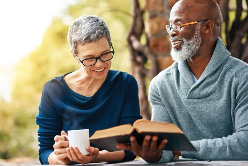 People reading from the Bible, a part of the religious studies programs at Maryville Retreat Center.