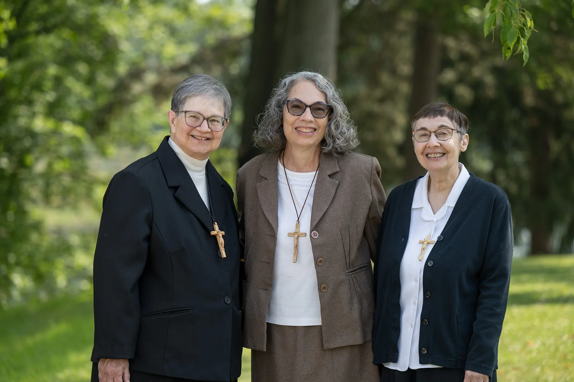 Sister Noel, Sister Judy and Sister Anna smile at Maryville Retreat Center in Holly, Michigan.