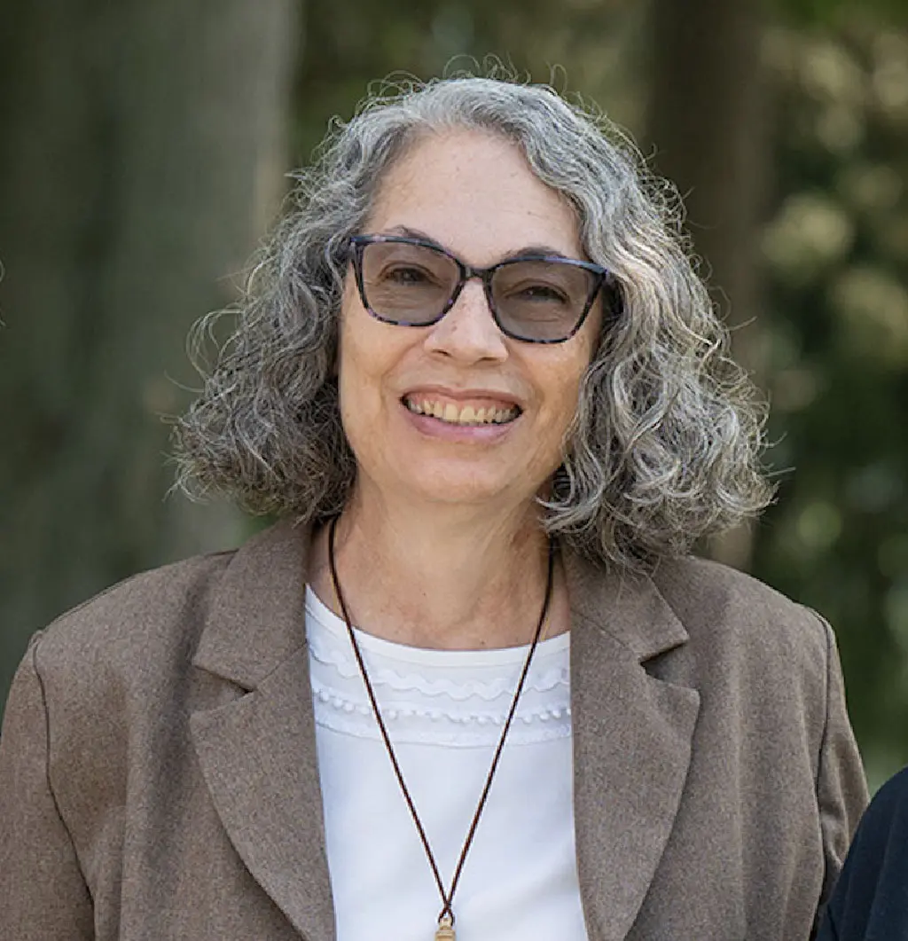 Sr. Judy Blizzard smiles outdoors at Maryville Retreat Center.