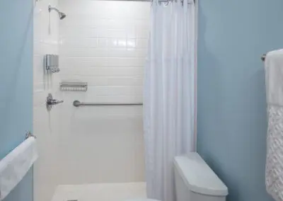 Room bathroom at Maryville Retreat Center showing amenities and interior features.