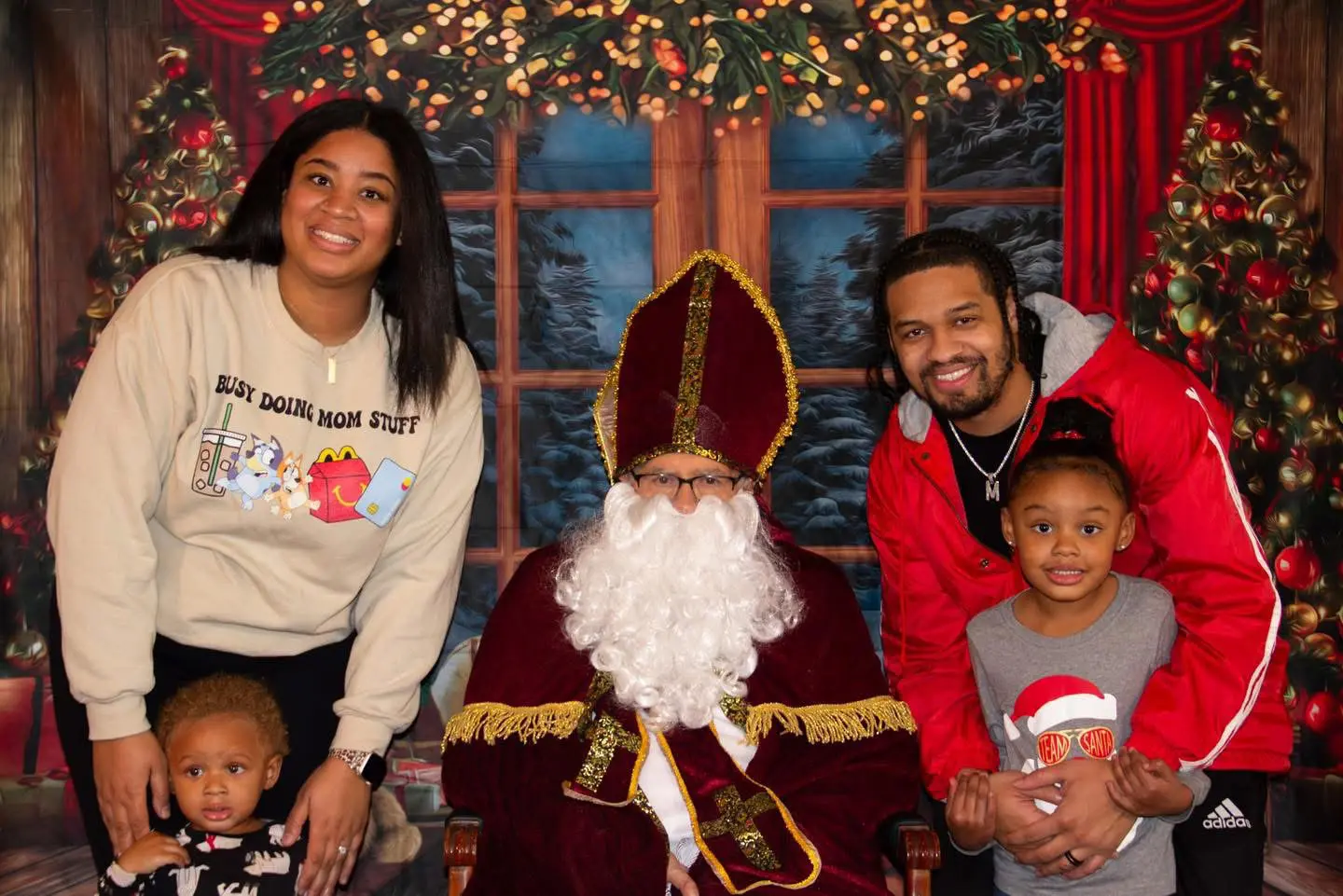 Family enjoying the Brunch with St. Nicholas event at Maryville Retreat Center, part of our faith based programs.
